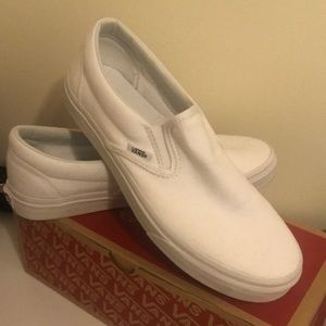 White pair of classic slip-on vans.